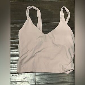 Light pink Lulu lemon tank size 2. Gently used.